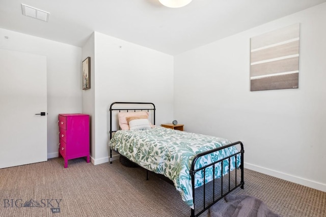 bedroom featuring carpet, visible vents, and baseboards