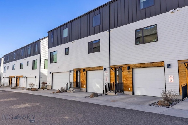 exterior space featuring a garage and board and batten siding