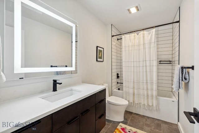 full bath with toilet, vanity, visible vents, and shower / bath combo