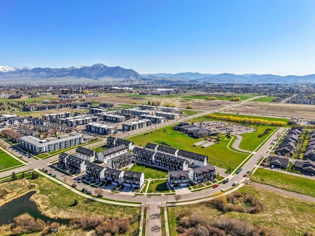 bird's eye view with a mountain view