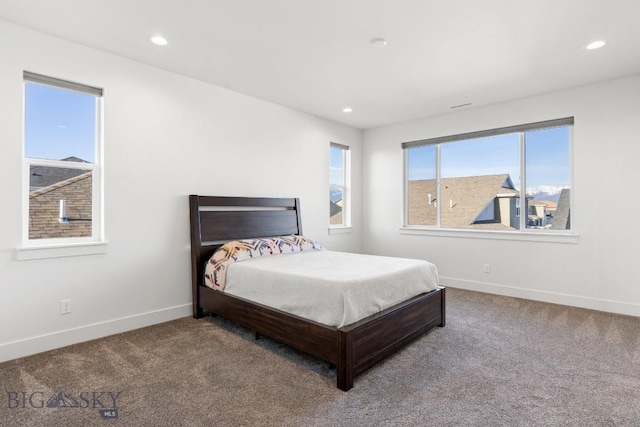 carpeted bedroom with baseboards and recessed lighting