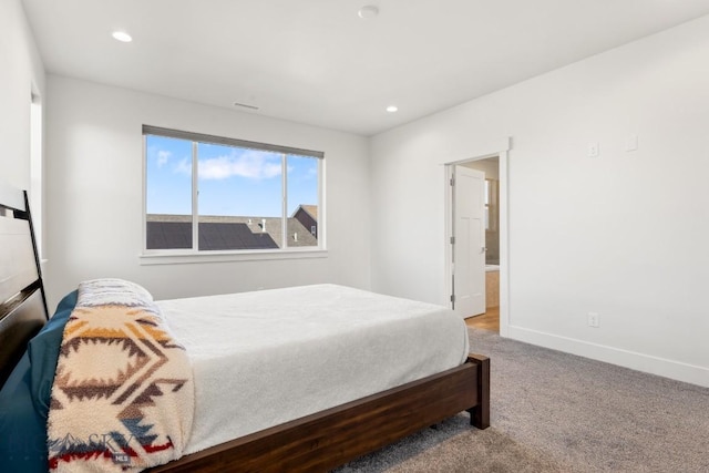 carpeted bedroom with baseboards and recessed lighting