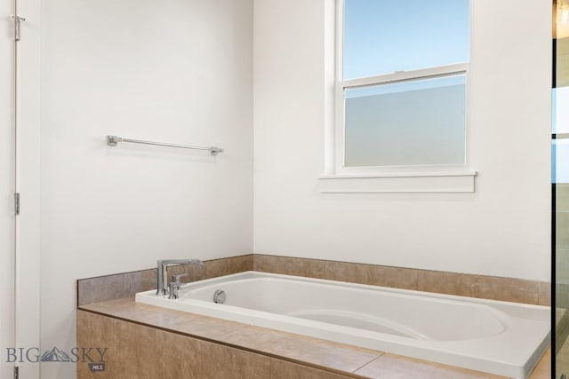 full bathroom with a garden tub