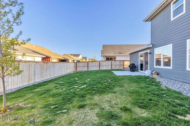 view of yard featuring a fenced backyard