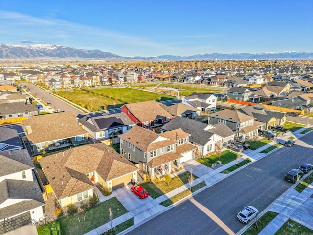 drone / aerial view featuring a mountain view and a residential view