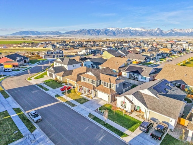 bird's eye view featuring a residential view and a mountain view