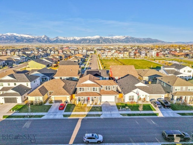 aerial view featuring a mountain view and a residential view
