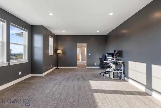 carpeted office space with baseboards and recessed lighting