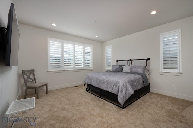 bedroom with carpet, baseboards, and recessed lighting
