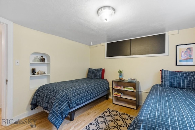 1014 S 6th St, Bozeman, MT 59715 - bedroom featuring baseboards and wood finished floors