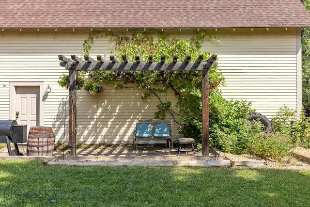 1014 S 6th St, Bozeman, MT 59715 - back of house with a shingled roof, heating fuel, and a lawn