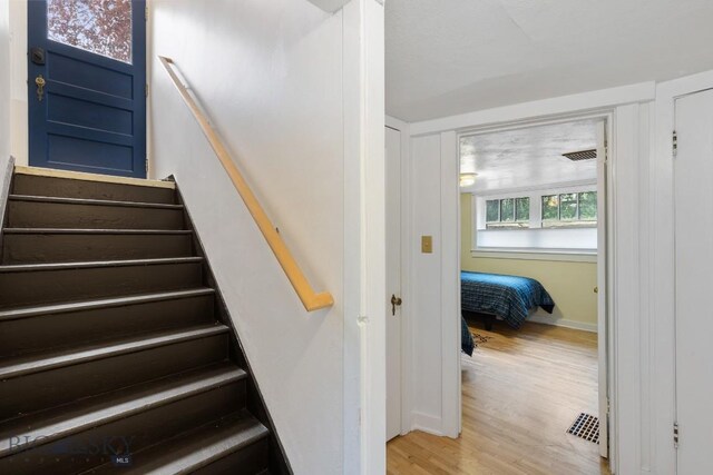 1014 S 6th St, Bozeman, MT 59715 - stairway featuring wood finished floors
