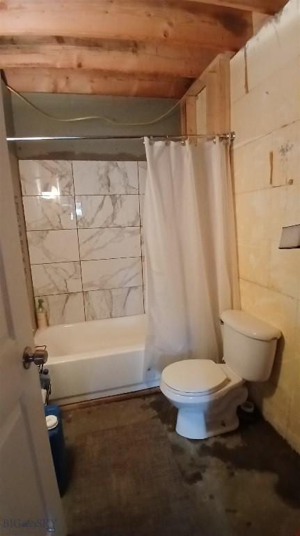 1842 Skyline Rd, Three Forks, MT 59752 - full bathroom featuring toilet, tile walls, and shower / tub combo