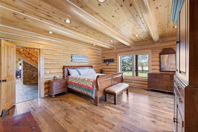 bedroom featuring wooden ceiling, recessed lighting, hardwood / wood-style floors, and log walls