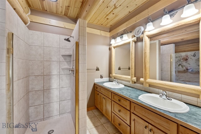 full bathroom with a sink, double vanity, tiled shower, and wooden ceiling