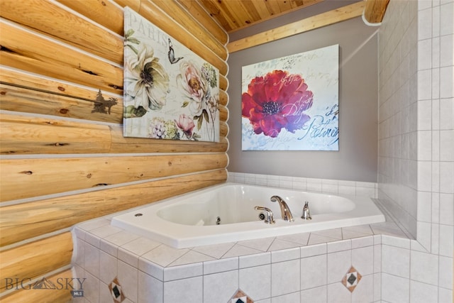 full bathroom featuring a tub with jets