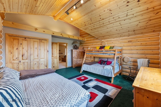bedroom featuring wooden ceiling, carpet flooring, rustic walls, and track lighting
