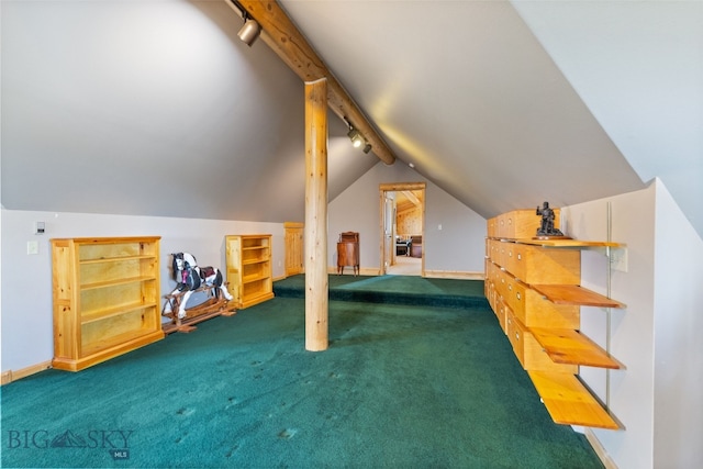 additional living space with lofted ceiling with beams, carpet floors, and baseboards