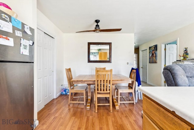 116 Michael Grove Ave, Bozeman, MT 59718 - dining room with light wood finished floors and a ceiling fan