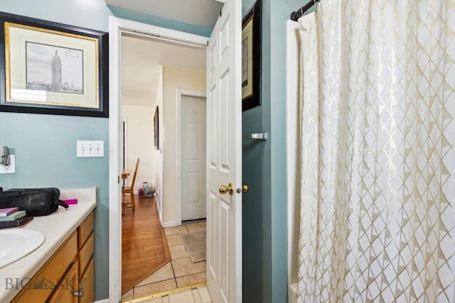 116 Michael Grove Ave, Bozeman, MT 59718 - full bath with vanity, a shower with curtain, and tile patterned flooring