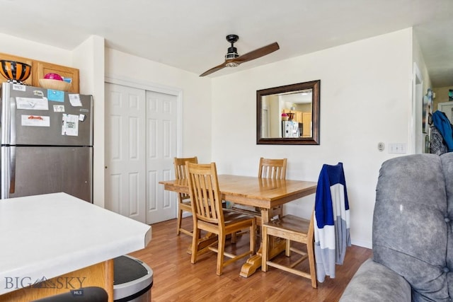 116 Michael Grove Ave, Bozeman, MT 59718 - dining room featuring baseboards, light wood-type flooring, and a ceiling fan