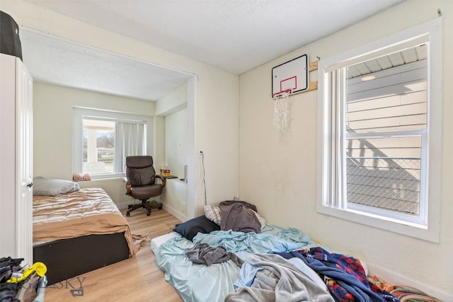 502 W Front St, Livingston, MT 59047 - bedroom with baseboards and wood finished floors