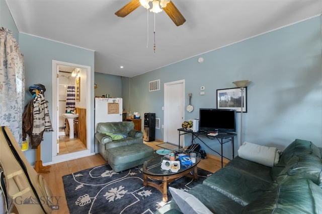 502 W Front St, Livingston, MT 59047 - living area with a ceiling fan, visible vents, and wood finished floors