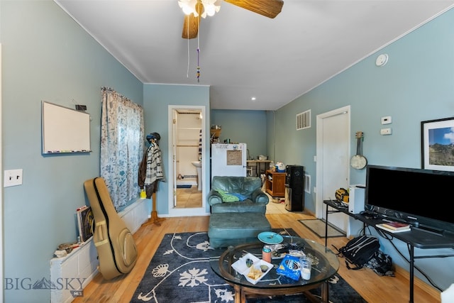 502 W Front St, Livingston, MT 59047 - living area with a ceiling fan, visible vents, and wood finished floors
