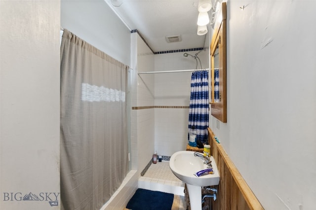 502 W Front St, Livingston, MT 59047 - bathroom featuring a sink and a shower stall