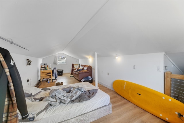 502 W Front St, Livingston, MT 59047 - bedroom with wood finished floors and lofted ceiling