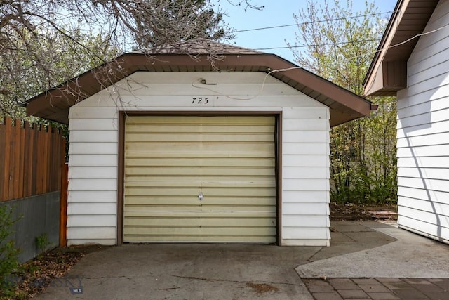 garage featuring fence