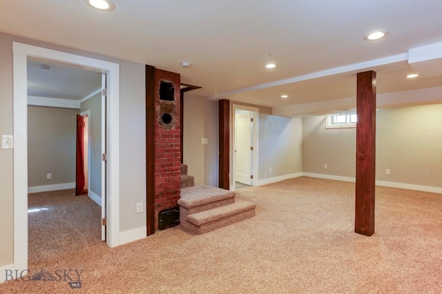 below grade area with recessed lighting, baseboards, and carpet floors