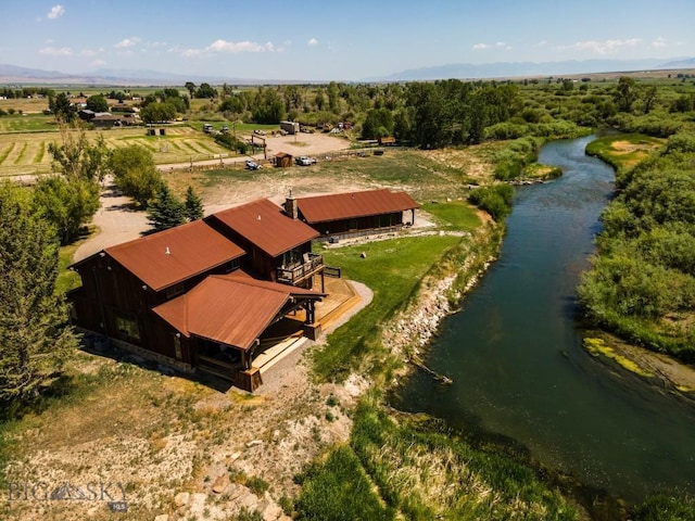 bird's eye view with a water view and a rural view