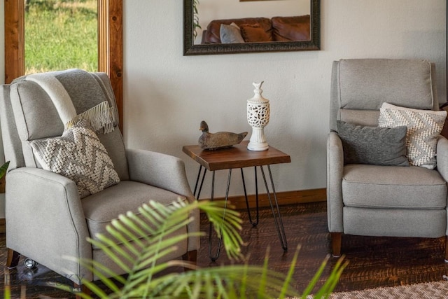 sitting room featuring baseboards