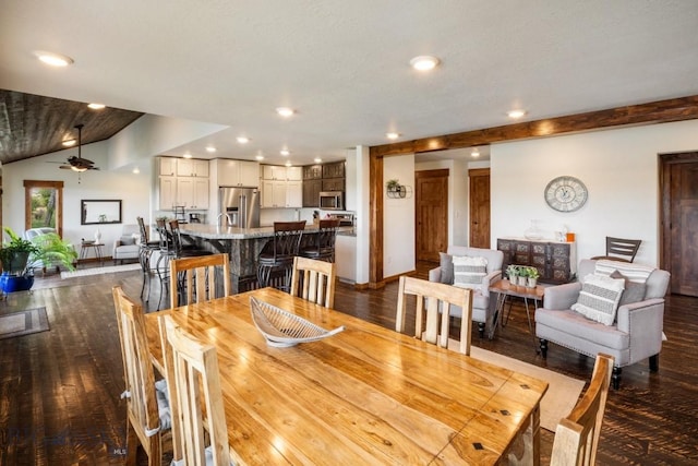 dining room with recessed lighting, dark wood-style floors, and vaulted ceiling