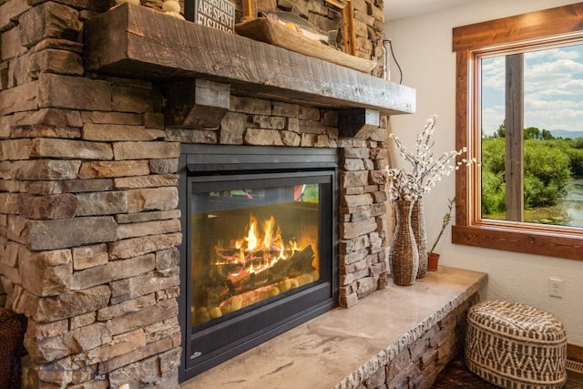 room details featuring a stone fireplace