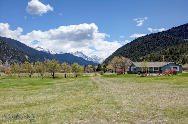 view of mountain feature with a rural view