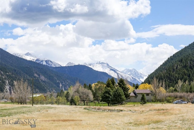 mountain view featuring a rural view and a forest view