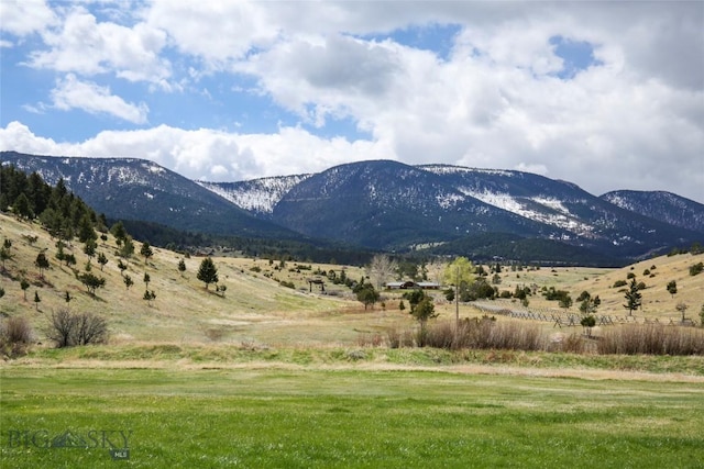 property view of mountains featuring a rural view