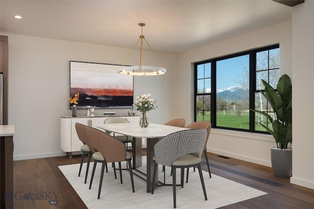 5680 Staffanson Rd, Bozeman, MT 59718 - dining space with baseboards, wood finished floors, recessed lighting, and a chandelier