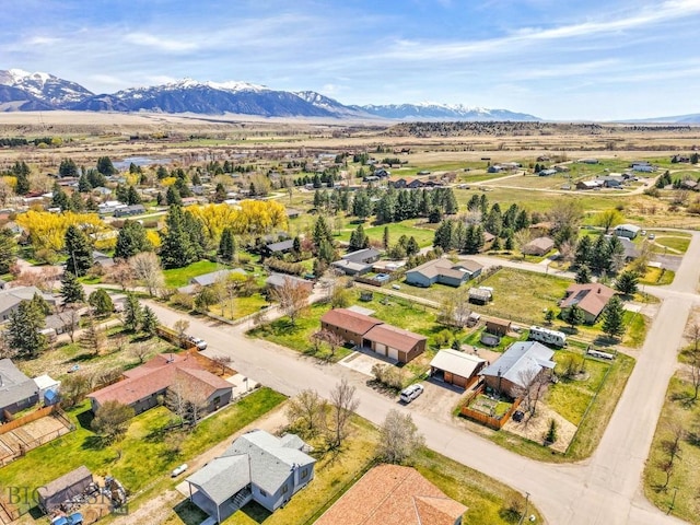 drone / aerial view with a mountain view and a residential view