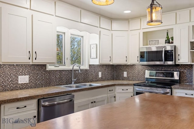 kitchen with open shelves, stainless steel appliances, white cabinets, and a sink