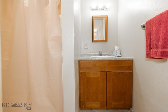 2 Dayspring Rd W, Sheridan, MT 59749 - bathroom featuring vanity and a shower with shower curtain