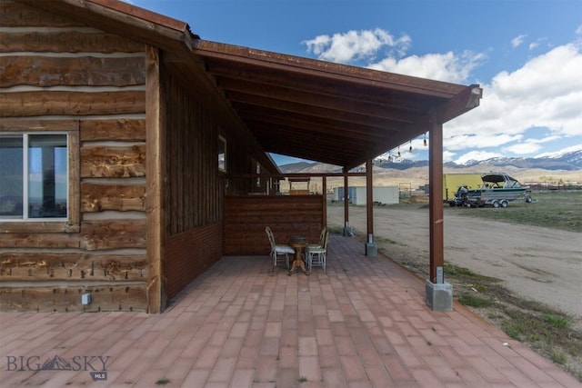 2 Dayspring Rd W, Sheridan, MT 59749 - view of patio / terrace with a mountain view and outdoor dining area