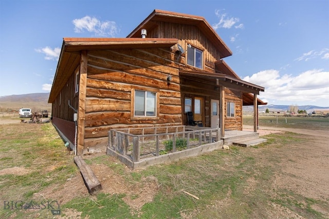 2 Dayspring Rd W, Sheridan, MT 59749 - view of side of home featuring a mountain view and log siding
