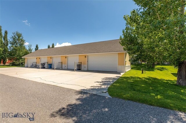 4277 W Babcock St Unit 6, Bozeman, MT 59718 - ranch-style house featuring a front yard, roof with shingles, and community garages