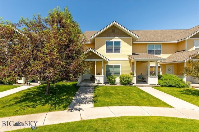 4277 W Babcock St Unit 6, Bozeman, MT 59718 - view of front of property with covered porch and a front lawn