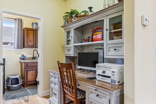 304 Farmall Ln, Manhattan, MT 59741 - home office featuring light wood-style flooring and built in desk
