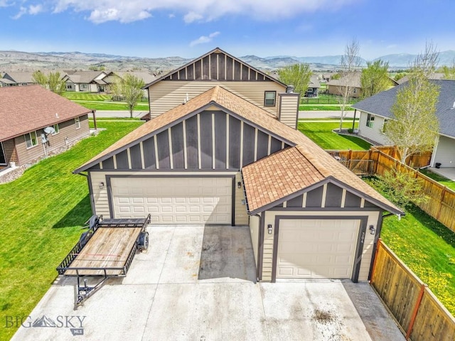 304 Farmall Ln, Manhattan, MT 59741 - view of front of home featuring a mountain view, a shingled roof, board and batten siding, and concrete driveway