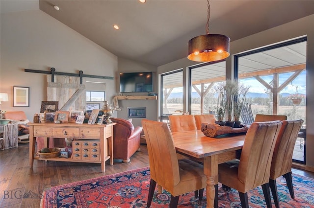 11762 Gooch Hill Rd, Gallatin Gateway, MT 59730 - dining room with hardwood / wood-style flooring, recessed lighting, a barn door, and high vaulted ceiling
